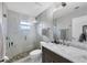 Updated bathroom with a glass-enclosed shower, modern fixtures, and stone accents for a spa-like feel at 612 Bayshore Rd, Nokomis, FL 34275