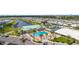 Aerial view of the community pool, clubhouse, and marina at 614 N Waterway, Venice, FL 34285