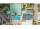 Overhead view of the community pool, clubhouse, shuffleboard, and pickleball courts at 614 N Waterway, Venice, FL 34285