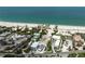 Aerial view of a vacant lot near the ocean, highlighting its proximity to the beach at 616 S Casey Key Rd, Nokomis, FL 34275