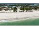 Expansive aerial view of beach vacant lot; potential development opportunity with stunning coastal scenery and water access at 616 S Casey Key Rd, Nokomis, FL 34275