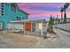Coastal home with a covered carport and modern design elements at 616 S Casey Key Rd, Nokomis, FL 34275