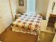 Bedroom showcasing a cozy bed, white nightstand, dresser, and closet at 623 Leisure, Venice, FL 34285