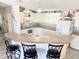 This pristine kitchen is equipped with modern appliances, ample counter space, and bar seating at 623 Leisure, Venice, FL 34285