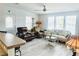 Bright living area with modern flooring, comfortable seating, and ample natural light at 623 Leisure, Venice, FL 34285