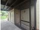 Neutral condo entrance with screened porch and ample storage at 624 White Pine Tree Rd # 5, Venice, FL 34285