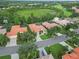 Neighborhood aerial view showcasing the community's layout and features, including green spaces and well-maintained homes at 6619 Pinefeather Ct, Bradenton, FL 34203