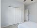 Bright bedroom featuring a double closet and neutral walls, creating a cozy and inviting space at 6619 Pinefeather Ct, Bradenton, FL 34203