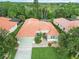 Inviting single-Gathering home with a well-manicured lawn and lush landscaping at 6619 Pinefeather Ct, Bradenton, FL 34203