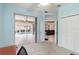 Home office opens up to the screened in pool area and lanai at 6619 Pinefeather Ct, Bradenton, FL 34203