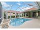 Gorgeous screened-in pool area with a large, inviting pool and plenty of space for outdoor entertaining at 6619 Pinefeather Ct, Bradenton, FL 34203
