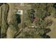 Birds-eye view of the property with lush tree coverage at 7201 Daiquiri Ln, Tampa, FL 33634