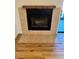 Cozy fireplace with mantle and tile surround at 7201 Daiquiri Ln, Tampa, FL 33634