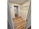 Walk-in closet with lots of storage space and wood-look flooring at 7201 Daiquiri Ln, Tampa, FL 33634