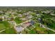 Aerial view of property with a home marker and views of the neighborhood and nearby amenities at 7257 Maguire Ln, Englewood, FL 34224