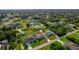Aerial view of property with a home marker and views of the neighborhood and nearby amenities at 7257 Maguire Ln, Englewood, FL 34224