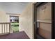 Exterior of unit 204 with views of the pond and landscaping from the front porch entry way at 756 White Pine Tree Rd # 204, Venice, FL 34285