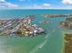Exclusive waterfront living: aerial view featuring private docks, stunning homes, and turquoise waters, a coastal dream come true at 931 Inlet Cir, Venice, FL 34285