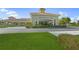 A beautiful building serving as the Venice Community Center, surrounded by manicured landscaping at 931 Inlet Cir, Venice, FL 34285