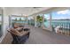 Spacious screened lanai features beautiful views of the water and plenty of seating at 931 Inlet Cir, Venice, FL 34285