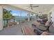 Relax on the spacious lanai, offering waterfront views and plenty of seating at 931 Inlet Cir, Venice, FL 34285