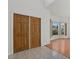Inviting foyer with double front doors, ceramic tile and new flooring at 9528 Knightsbridge Cir, Sarasota, FL 34238