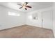 Bedroom with neutral walls, carpeted floor and ceiling fan at 2397 Morton Rd, North Port, FL 34291