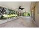 Spacious screened patio with ceiling fans, offering an excellent space for relaxation and outdoor enjoyment at 2397 Morton Rd, North Port, FL 34291