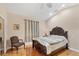 Bedroom with a ceiling fan, tile flooring, closet, and great natural lighting at 102 Bayamo Dr, North Port, FL 34287