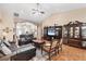 Comfortable living room featuring tile floors, vaulted ceilings, and a spacious layout at 102 Bayamo Dr, North Port, FL 34287