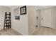 Inviting entryway featuring tile flooring and convenient access to the kitchen and other living spaces at 1100 Capri Isles Blvd # 215, Venice, FL 34292