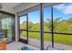 Spacious tiled lanai offering a beautiful waterfront view at 1100 Capri Isles Blvd # 215, Venice, FL 34292