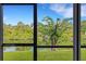Gorgeous waterfront view through screened lanai at 1100 Capri Isles Blvd # 215, Venice, FL 34292