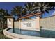 Signage for Venetian Falls community displayed over a body of water on a sunny day at 11192 Campazzo Dr, Venice, FL 34292