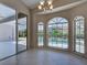 Breakfast nook featuring pool views, a sliding glass door and transom windows for ample natural lighting at 1136 Deardon Dr, Venice, FL 34292