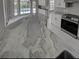 Modern kitchen featuring a large island with granite countertops and stainless steel appliances at 1136 Deardon Dr, Venice, FL 34292