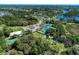 Aerial view of the community's various recreational facilities and lush landscaping at 11739 Okaloosa Dr, Venice, FL 34293