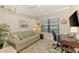 Comfortable office space with nautical decor, featuring a cozy couch and functional desk area at 11739 Okaloosa Dr, Venice, FL 34293