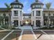 Attractive commercial buildings feature shops and eateries with outdoor seating areas at 11819 Tempest Harbor Loop, Venice, FL 34292