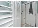 Bathroom shower features a clear glass door and tiled walls, offering a clean and functional space at 1198 Jamaica Rd, Venice, FL 34293