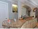 Kitchen featuring granite countertops, ample counter space, and neutral cabinets at 1198 Jamaica Rd, Venice, FL 34293