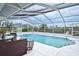 Enclosed pool area perfect for swimming, relaxing, and enjoying outdoor living at 1198 Jamaica Rd, Venice, FL 34293