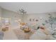 Open concept area includes living room and kitchen dining area at 1211 Capri Isles Blvd # 6, Venice, FL 34292