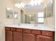 Double sink vanity in bathroom at 12187 Amica Loop, Venice, FL 34293