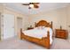 Inviting bedroom showcasing wood bed frame, side tables, and ample closet space at 12187 Amica Loop, Venice, FL 34293