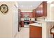 Efficient kitchen design with stainless steel appliances and granite countertops providing a modern look at 12187 Amica Loop, Venice, FL 34293