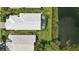 Aerial view of the property with a lake view at 1234 Harbor Town Way, Venice, FL 34292