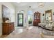 Foyer featuring wood floors and elegant furnishings at 1234 Harbor Town Way, Venice, FL 34292