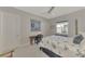 Comfortable bedroom featuring a full bed, a desk, and gray walls at 12404 Destin Loop, Venice, FL 34293