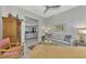 Cozy living room featuring gray walls, a comfortable sofa, and decorative accents at 12404 Destin Loop, Venice, FL 34293